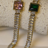 18K gold-plated square CZ pave curb link bracelet with an extender chain.