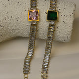 18K gold-plated square CZ pave curb link bracelet with an extender chain.