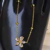 Gold-plated chain Bracelet With a Crystal Flower Pendant.