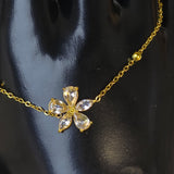 Gold-plated chain Bracelet With a Crystal Flower Pendant.
