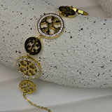 Gold-Plated stainless steel Tory Burch chain bracelet.