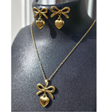Gold-plated bow-heart necklace and earring set.