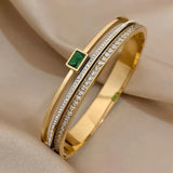 Emerald Accent Gold Bangle with cubic zirconia stone
