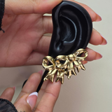Pair of gold-toned bow stud earrings